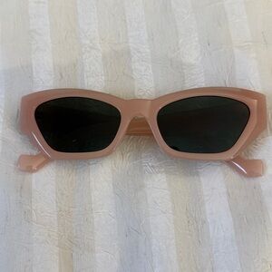 Vintage Pink Sunglasses. Retro style with jelly frames.